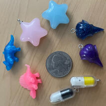 multiple colors: dinosaurs, pills, stars, bird skulls